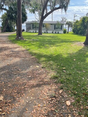 Property grounds -  2-bedroom lake house on Crescent Lake.Close to Daytona, Orlando, St.Augustine (Crescent City)