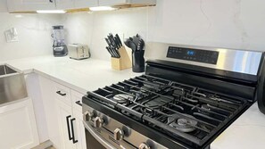 Fridge, microwave, oven, stovetop - Gillespie Dr 3BR 2BA Unit B | Near Downtown SD (Spring Valley)