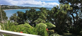Quintessential Kiwi Bach on quiet end of blissful NZ Far North beach.