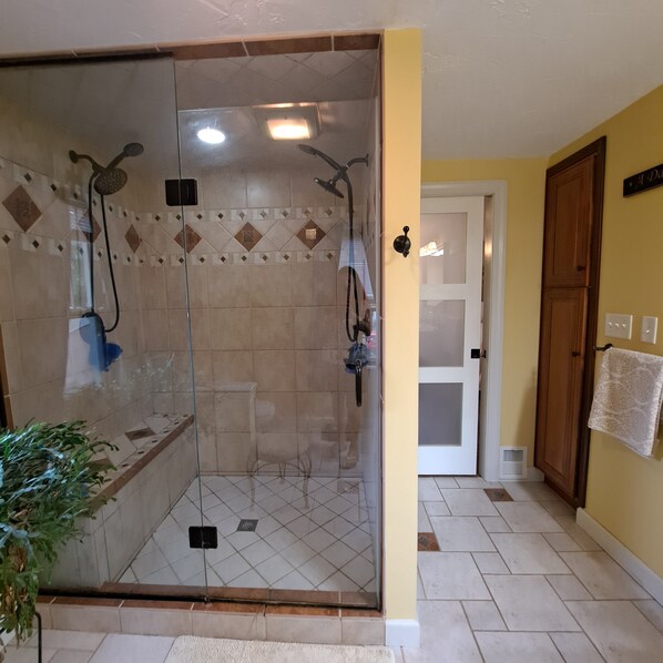 Shower, hair dryer, towels, soap