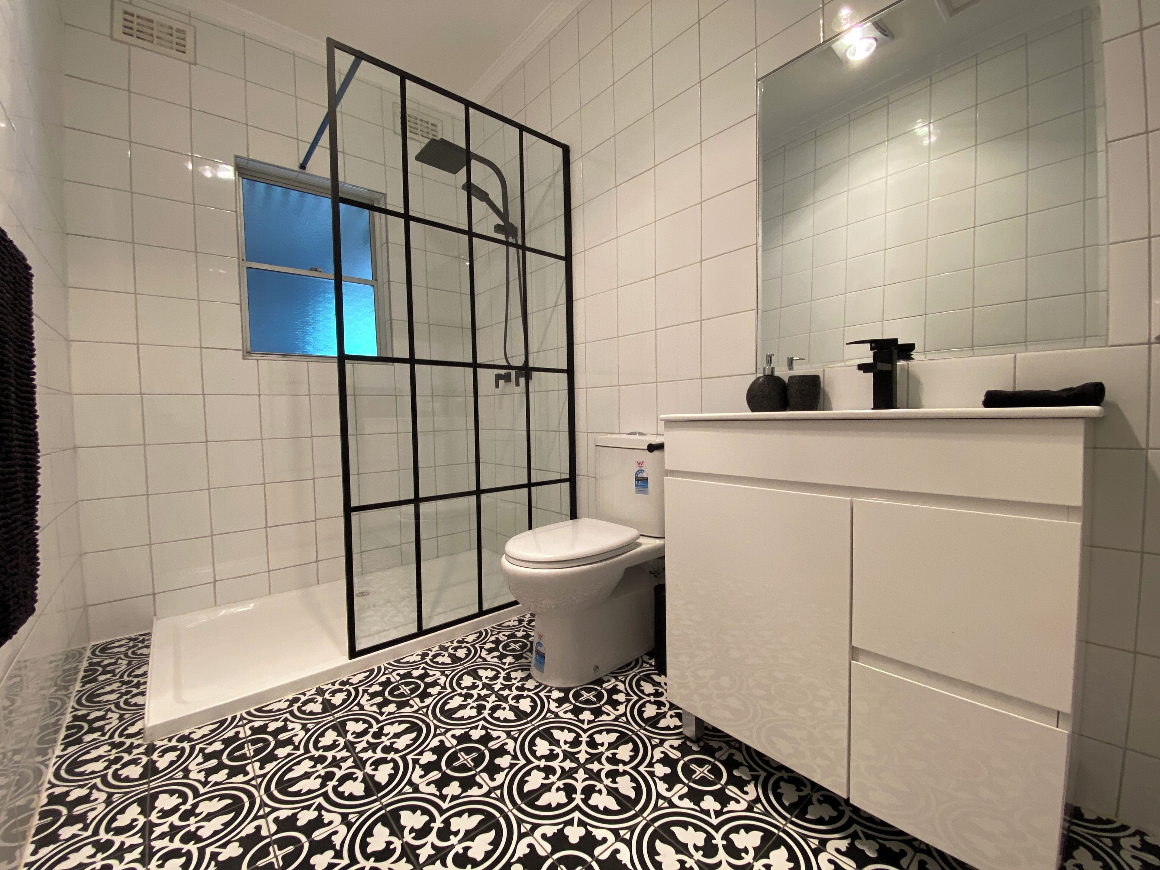 Shower, towels, soap, toilet paper