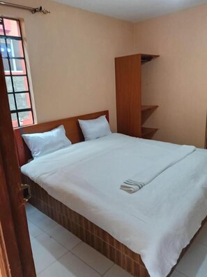 Habitación individual Deluxe, vistas al jardín | Wifi gratis y ropa de cama