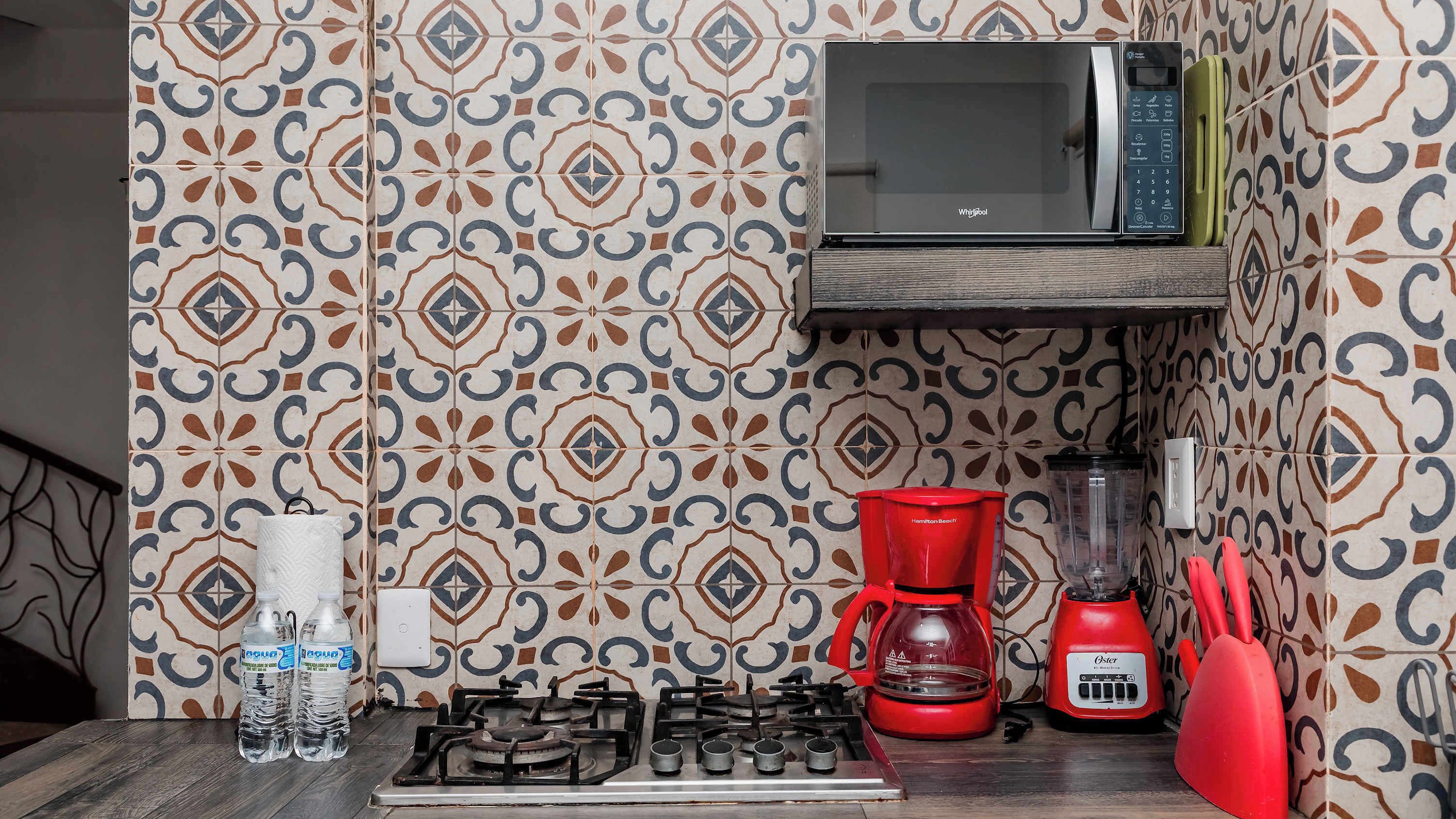 Fridge, microwave, stovetop, coffee/tea maker