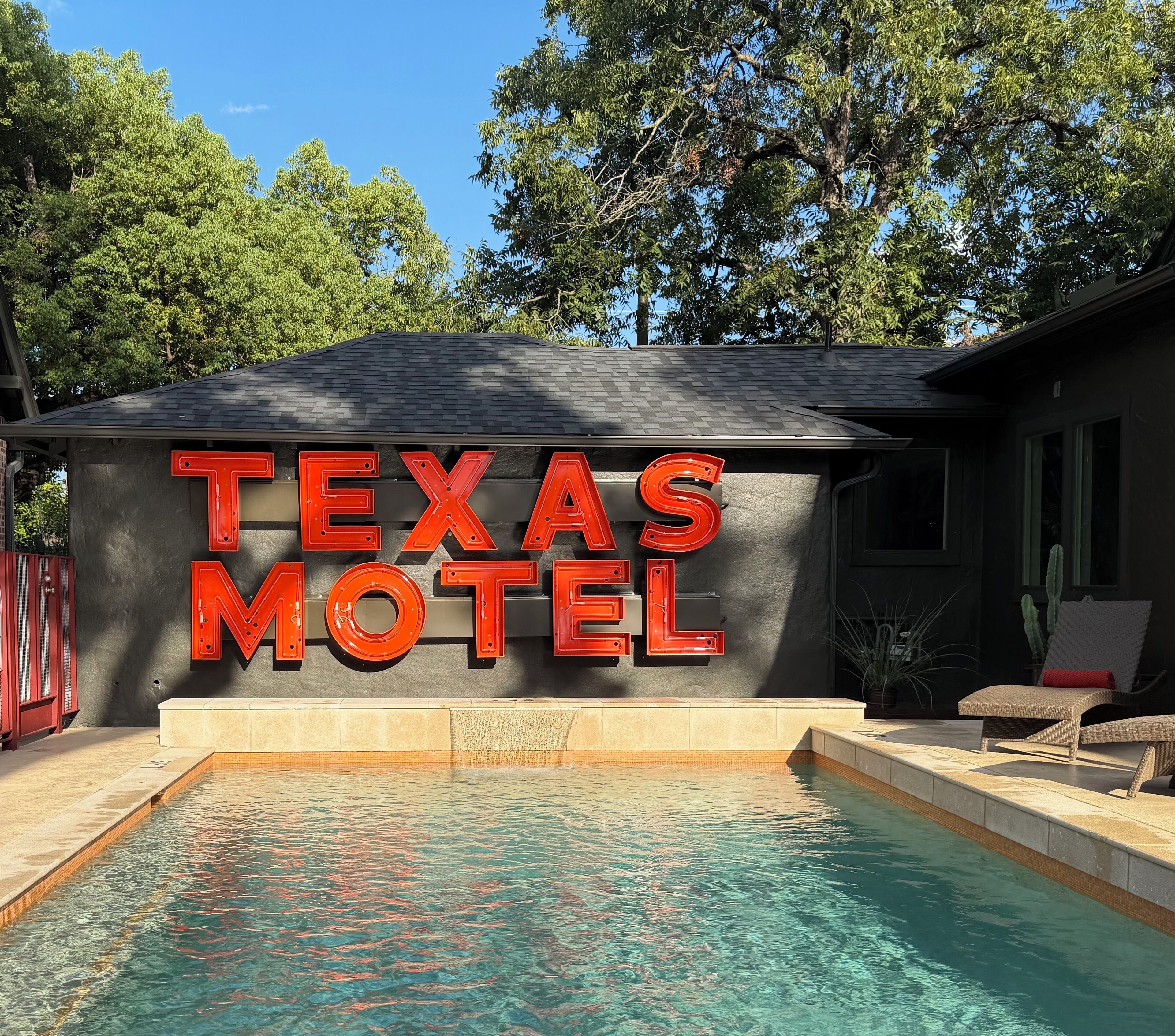 Outdoor pool, open 7:00 AM to 9:00 PM, pool loungers