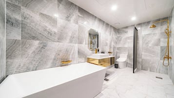 Premium Massage Chair | Bathroom | Free toiletries, hair dryer, bathrobes, bidet