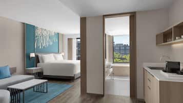 Family Room, 1 King Bed with Sofa bed | Premium bedding, minibar, in-room safe, individually furnished