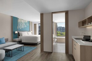 Family Room, 1 King Bed with Sofa bed | Premium bedding, minibar, in-room safe, individually furnished