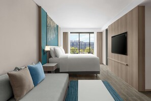 Family Room, 1 King Bed with Sofa bed | Premium bedding, minibar, in-room safe, individually furnished