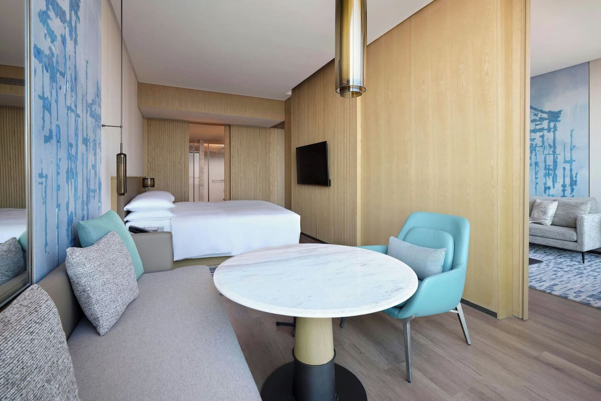 Club Suite, 1 King Bed | Down duvets, in-room safe, desk, blackout curtains