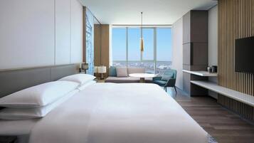 Deluxe Room, 1 King Bed | Down duvets, in-room safe, desk, blackout curtains