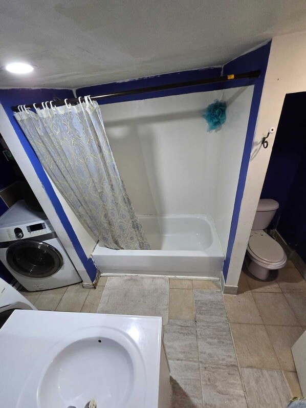 Hair dryer, towels, soap, toilet paper