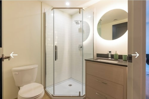 Modern 2-Bedroom Retreat Near Universities | Gym, Sauna & Theater