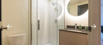 Modern 2-Bedroom Retreat Near Universities | Gym, Sauna & Theater