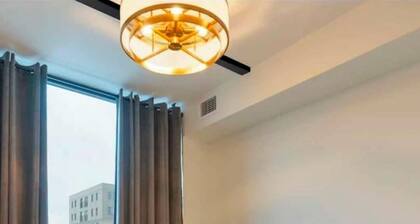 Modern 2-Bedroom Retreat Near Universities | Gym, Sauna & Theater