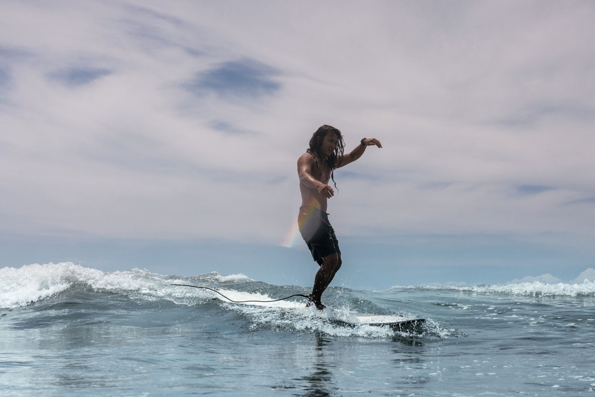 A person surfing on a wave.