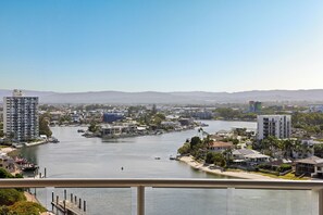 A river with buildings and a bridge. - Chevron Renaissance River View (Surfers Paradise)