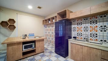 Dúplex, 4 habitaciones, vista a la ciudad | Cocina privada | Refrigerador y utensilios de cocina