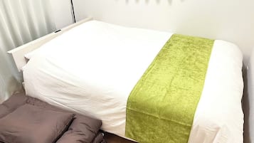 Desk, laptop workspace, blackout drapes, iron/ironing board