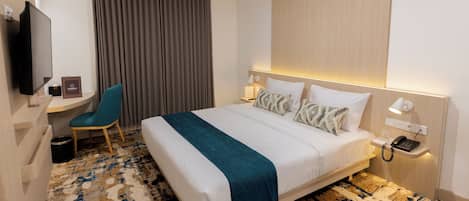 In-room safe, desk, laptop workspace