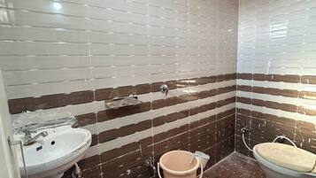 Shower, bidet, towels, soap