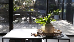 Outdoor dining - The Getaway ~ Cozy Beach Shack (MANYANA)