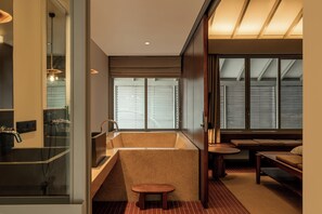 Family Studio, Pool View | Bathroom | Separate tub and shower, slippers, towels, soap - Brown Feather Pererenan (Bali / Badung)