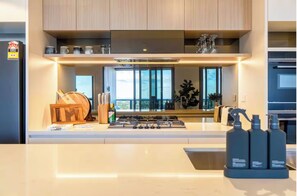 Microwave, oven, stovetop, dishwasher - River View Apt in Queens Wharf Lv 29 + Carpark (Brisbane City)