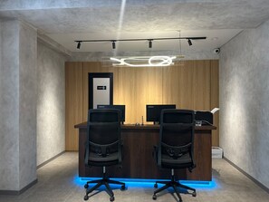 A modern office space with two desks, two chairs, and a 'STAFF ONLY' sign. - XO PANDAWA Adult Only (Kutuh)