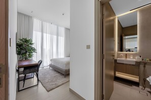 In-room safe, free WiFi - Chic 1BR Retreat with Pool & Balcony JVC (Dubai)