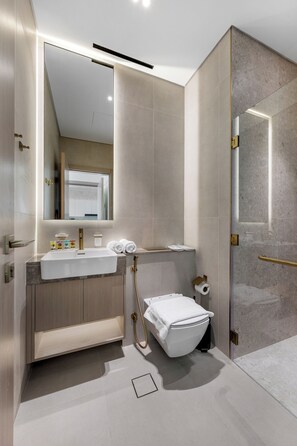 Deluxe Apartment, Balcony, City View | Bathroom | Slippers - Chic 1BR Retreat with Pool & Balcony JVC (Dubai)