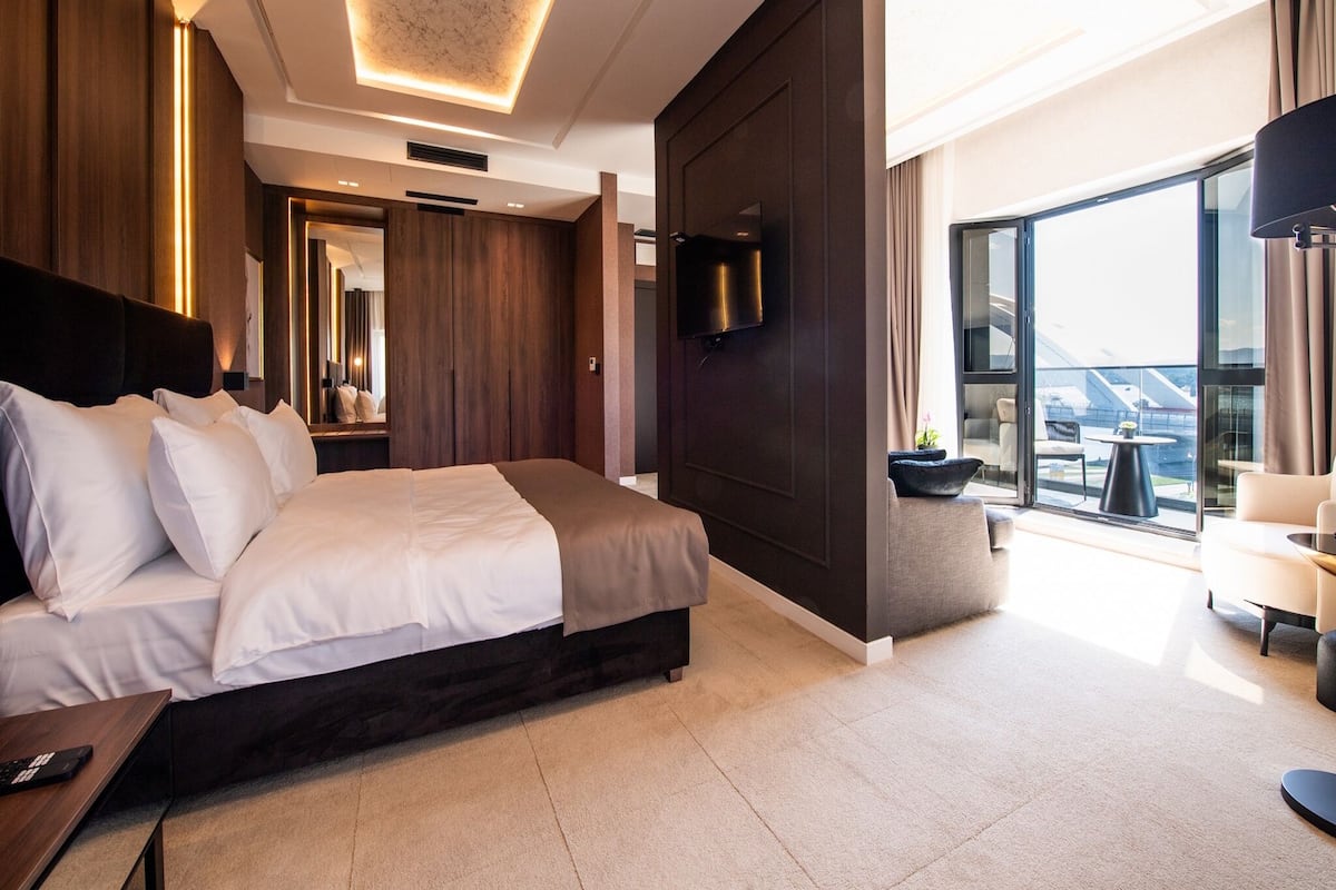 Junior Studio Suite, River View | Living area | LED TV