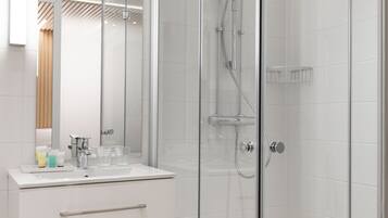 Triple Room, City View | Bathroom | Shower, hair dryer, towels, toilet paper