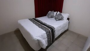 3 habitaciones, tabla de planchar con plancha y internet 