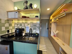 Monolocale comfort, vista città | Cucina privata