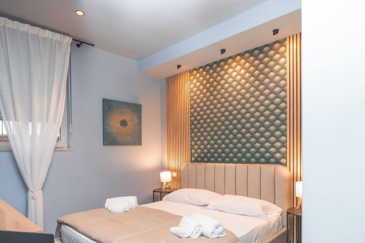 Family Quadruple Room, City View | In-room safe, desk, laptop workspace, soundproofing