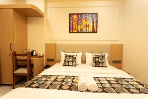 Deluxe Double Room, City View | Desk, laptop workspace, iron/ironing board, free WiFi - Alpine Stays By Oran Hotels  (Udaipur)