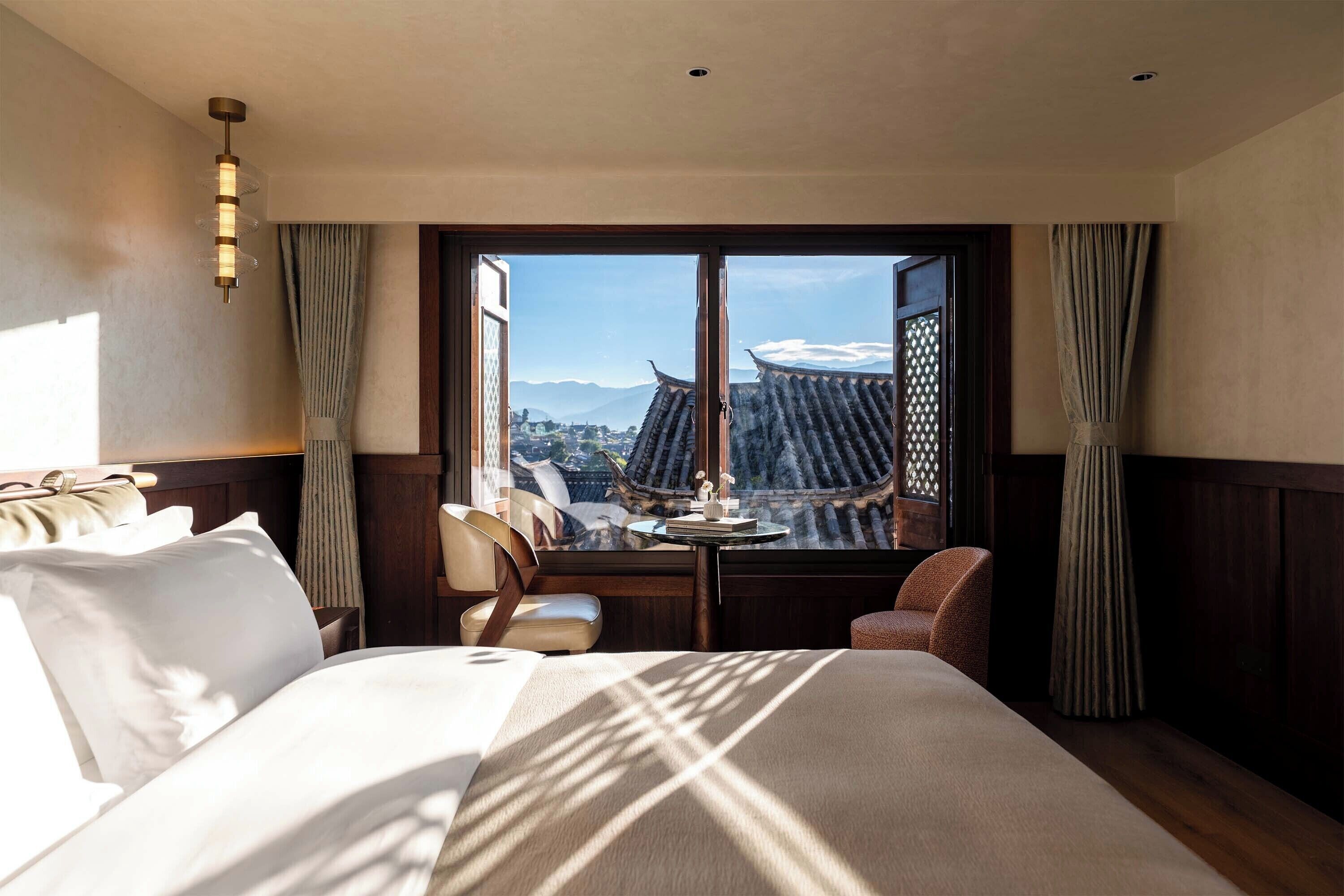 Familiesuite, hageutsikt | Minibar (inkludert), safe på rommet, skrivebord og blendingsgardiner