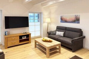 Smart-TV, Kamin, Stereoanlage