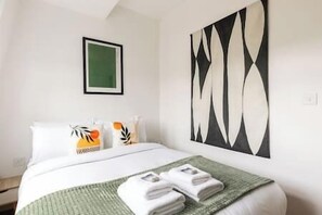 2 chambres, fer et planche à repasser, Wi-Fi, draps fournis