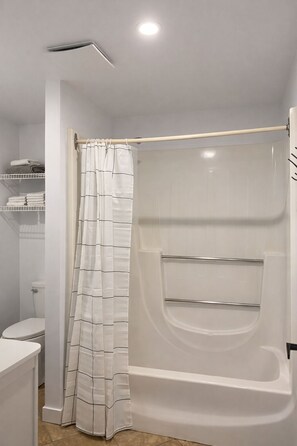 Hair dryer, towels, soap, toilet paper