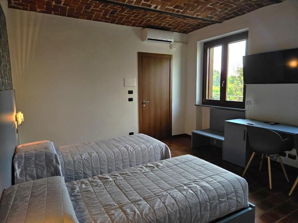 Dobbeltværelse med dobbeltseng eller 2 enkeltsenge - udsigt til have | Gratis Wi-Fi