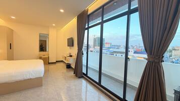 Deluxe Double Room, City View | Desk, laptop workspace, free WiFi