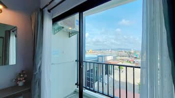 Quarto triplo grand, banheira | Parte interna