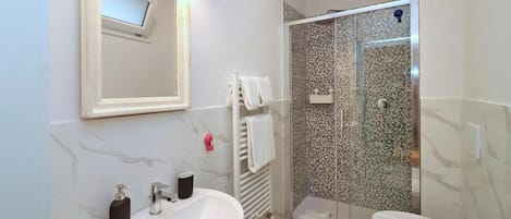 Hair dryer, towels, toilet paper