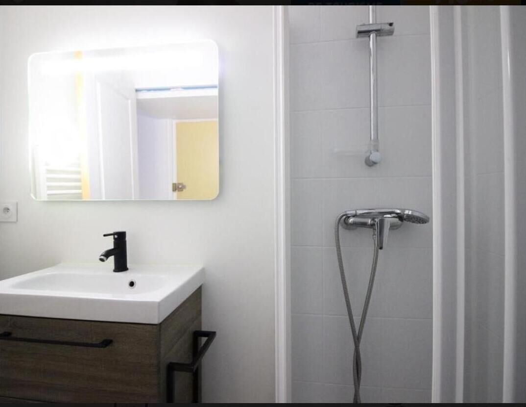 Shower, hair dryer, towels, toilet paper