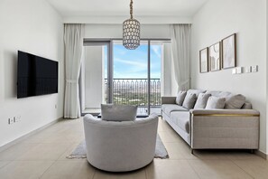 Deluxe Apartment, Balcony, Desert view | Living area - 1BR Downtown and Dubai Frame Views (Dubai)