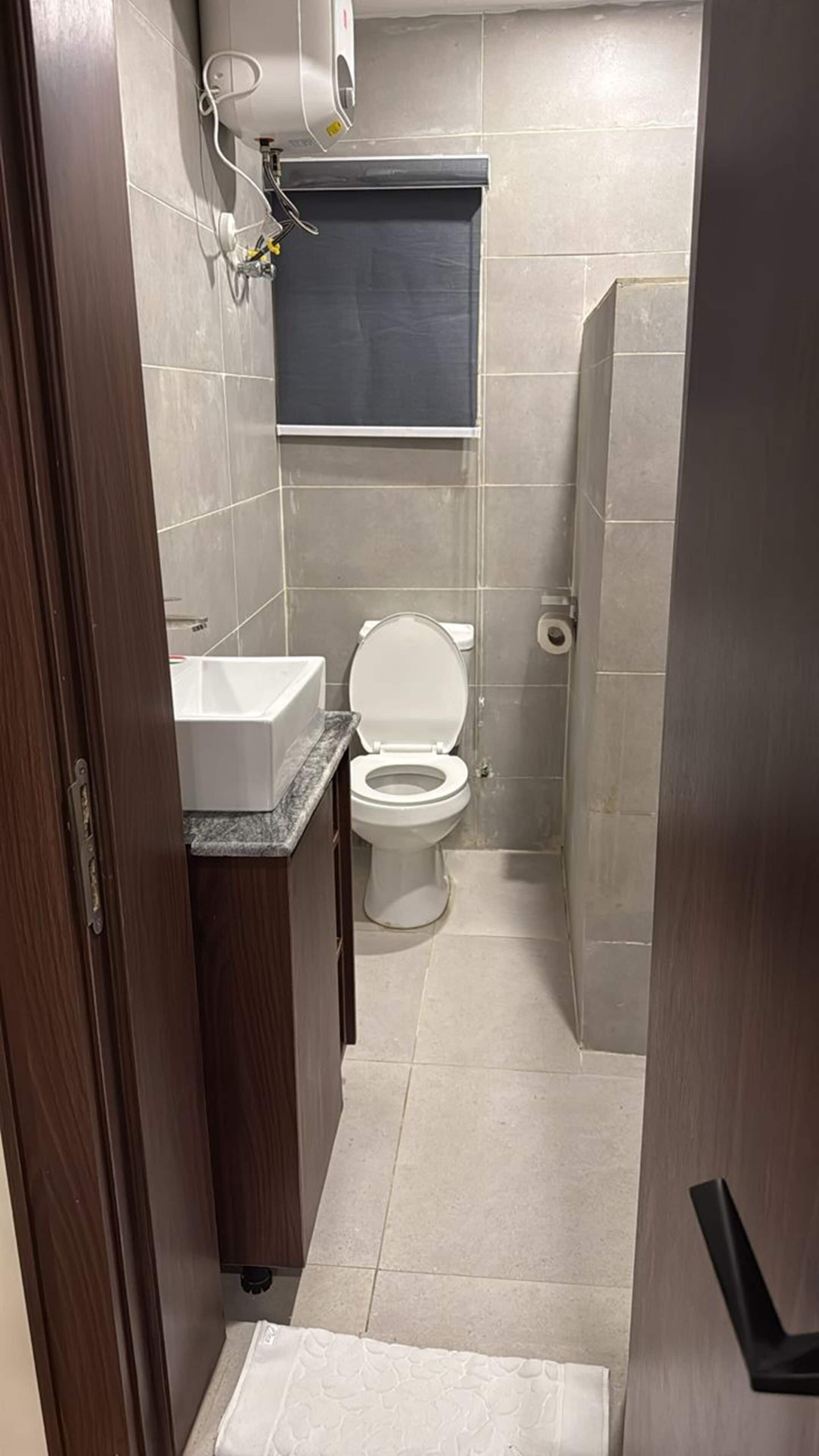 Studio Deluxe | Salle de bain | Douche, serviettes fournies