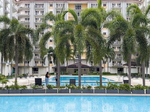 2 outdoor pools - GemstoneBR in SMDC Field Residences (Las Pinas)