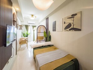 43-inch flat-screen TV with digital channels - GemstoneBR in SMDC Field Residences (Las Pinas)