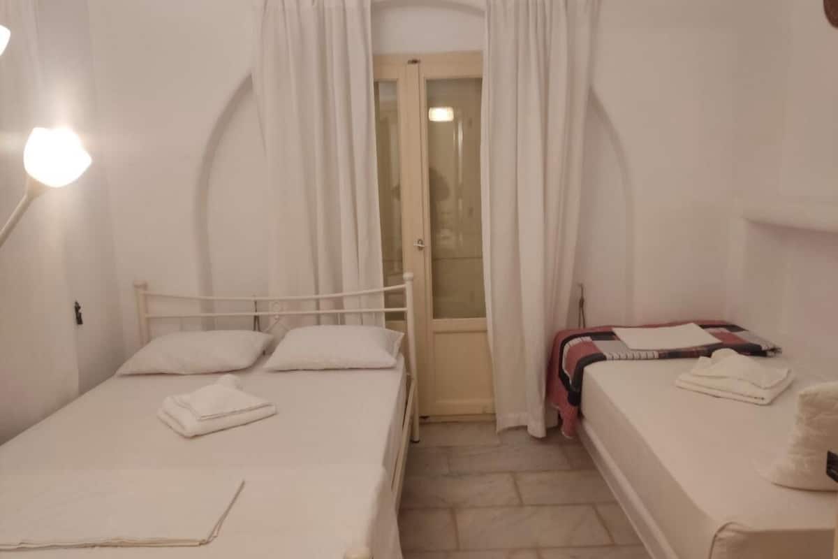 Laptop workspace, blackout curtains, soundproofing, iron/ironing board